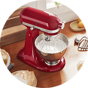 A KitchenAid® stand mixer making whipped cream