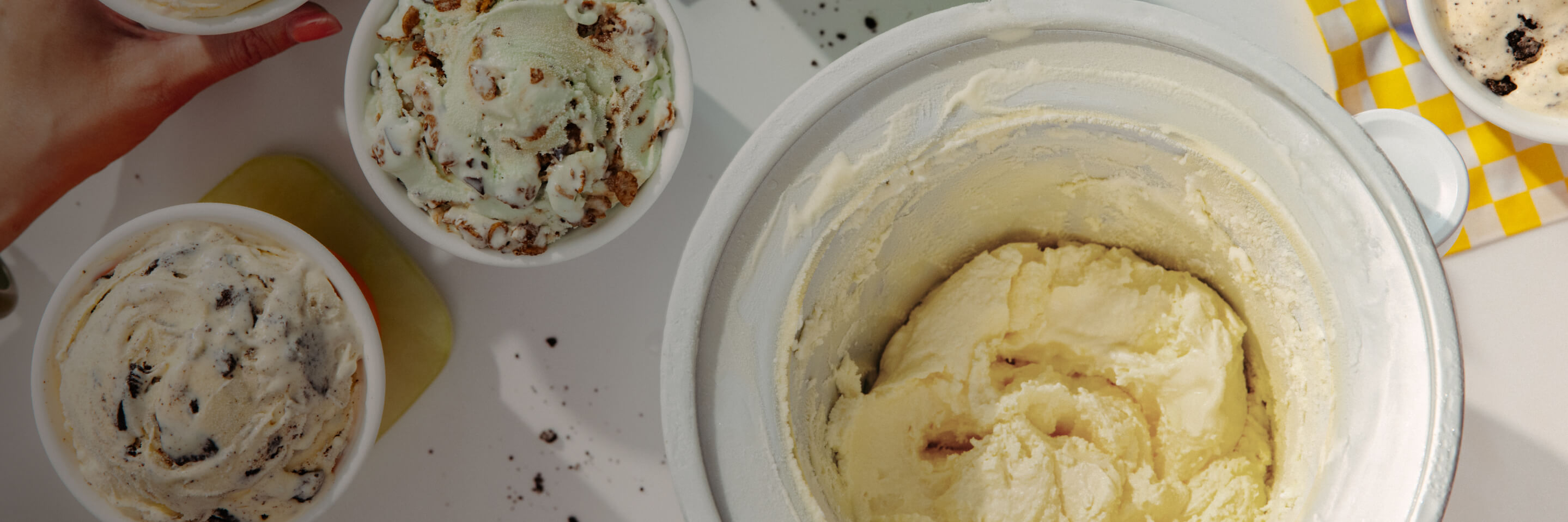 A KitchenAid® ice cream maker attachement full of ice cream seen from above
