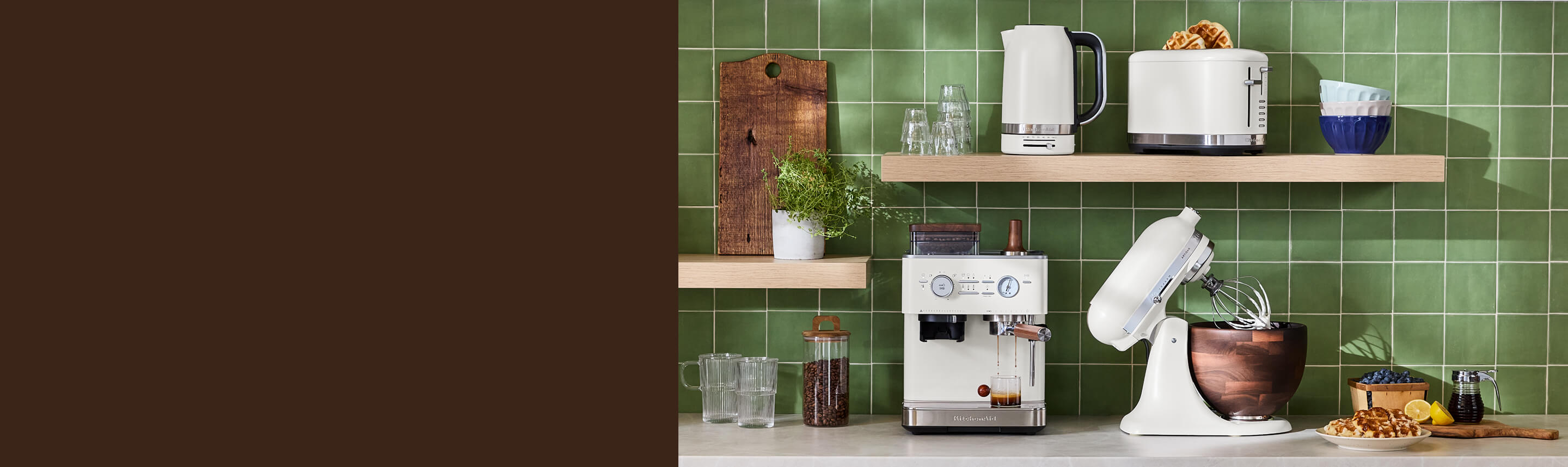 A collection of white KitchenAid® countertop appliances