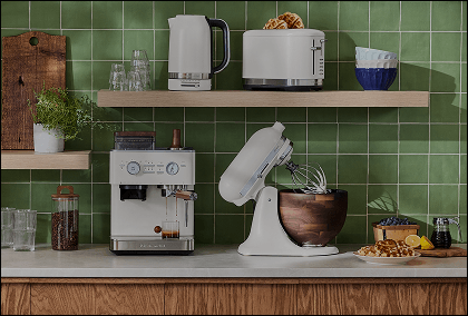 A collection of white KitchenAid® countertop appliances