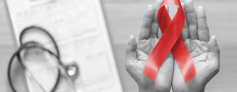 Rote Schleife (Red Ribbon) als Zeichen für Solidarität mit HIV-Infizierten.