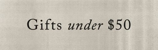 Text reading "Gifts under $50" in black serif font on a beige textured background