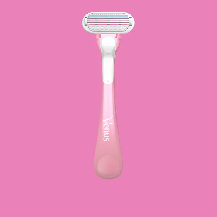 Venus Sensitive disposable razor in pink with 3-blade cartridge and blue moisture strip
