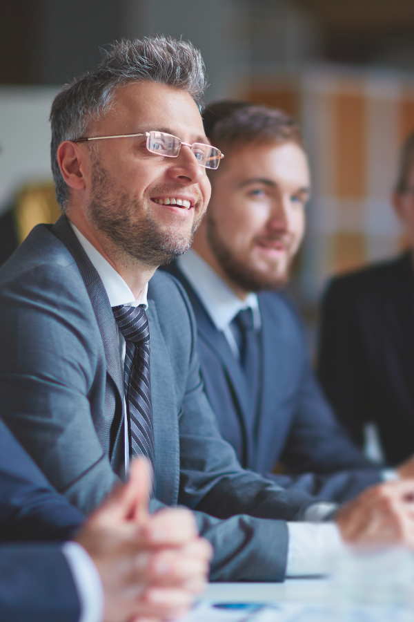 Smiling man leverages outsourced business solutions to evolve his business