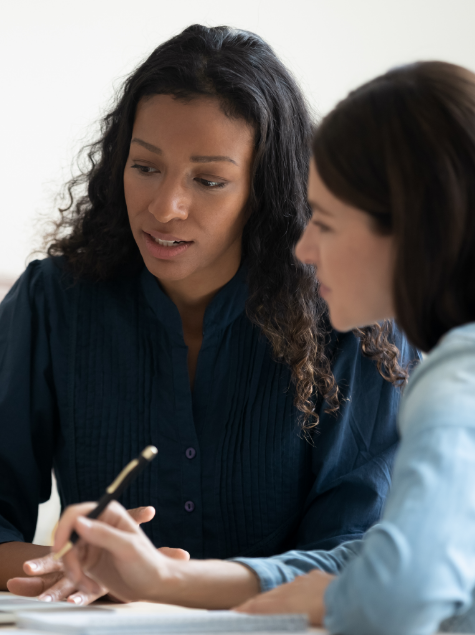 Millennial women sitting in front of a PC learning about financial planning and investing