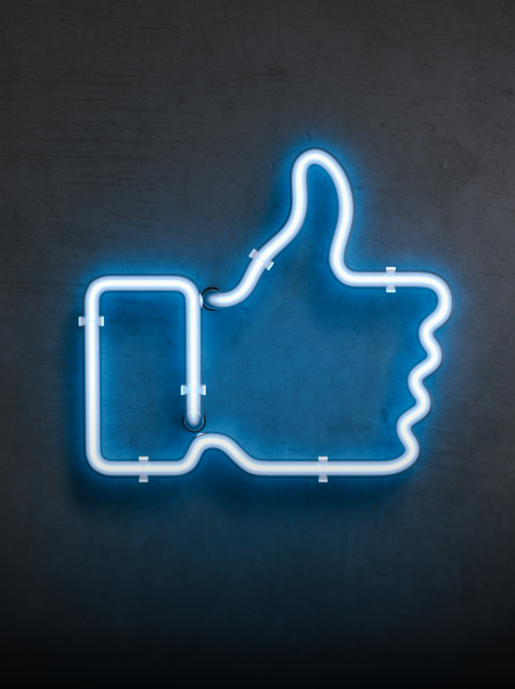 Thumbs up icon as a blue neon light