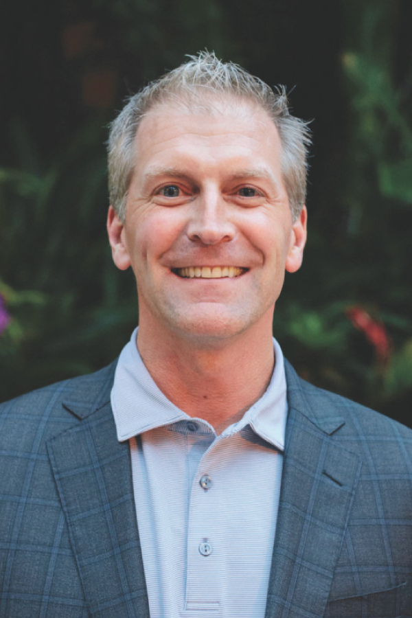 advisor smiling looking at camera