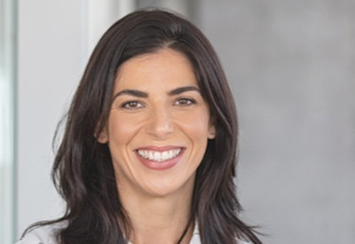 a brown-haired high-net-worth woman client