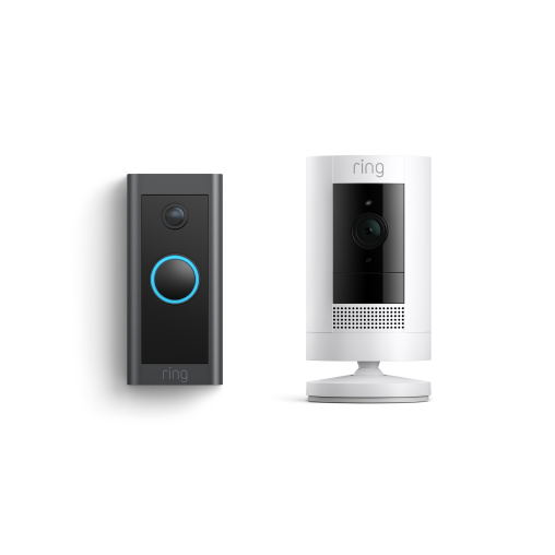 Wired Ring Video Doorbell in black with blue-lit button and Stick Up Cam in white. 