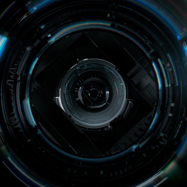 Video showing movement through a Ring camera lens with the aperture opening to reveal a bulldog sitting on the grass with animated lines revealing increasing color and clarity.