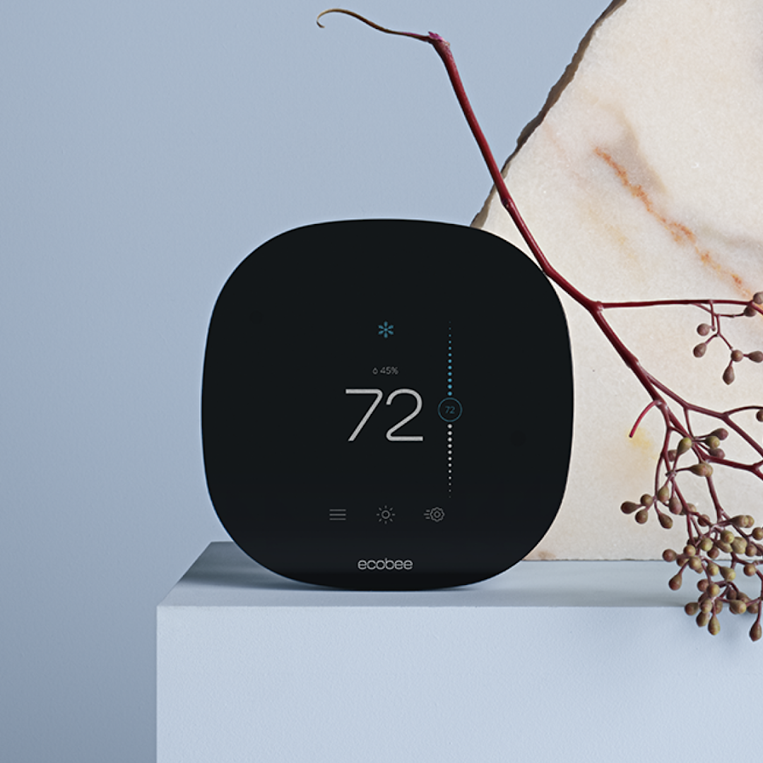 SmartThermostat with voice control on a blue background
