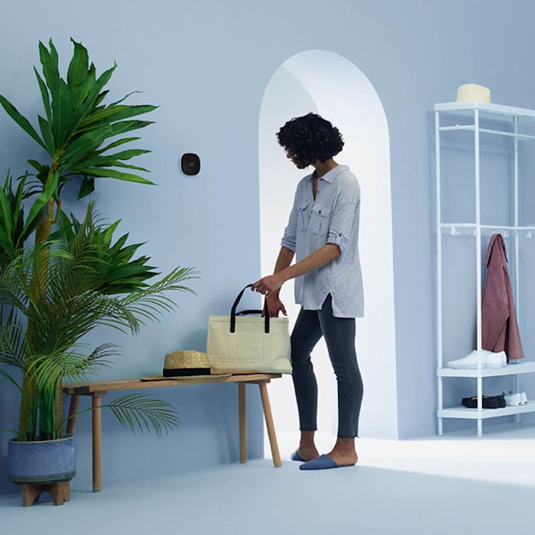 Person grabbing their purse when arriving home