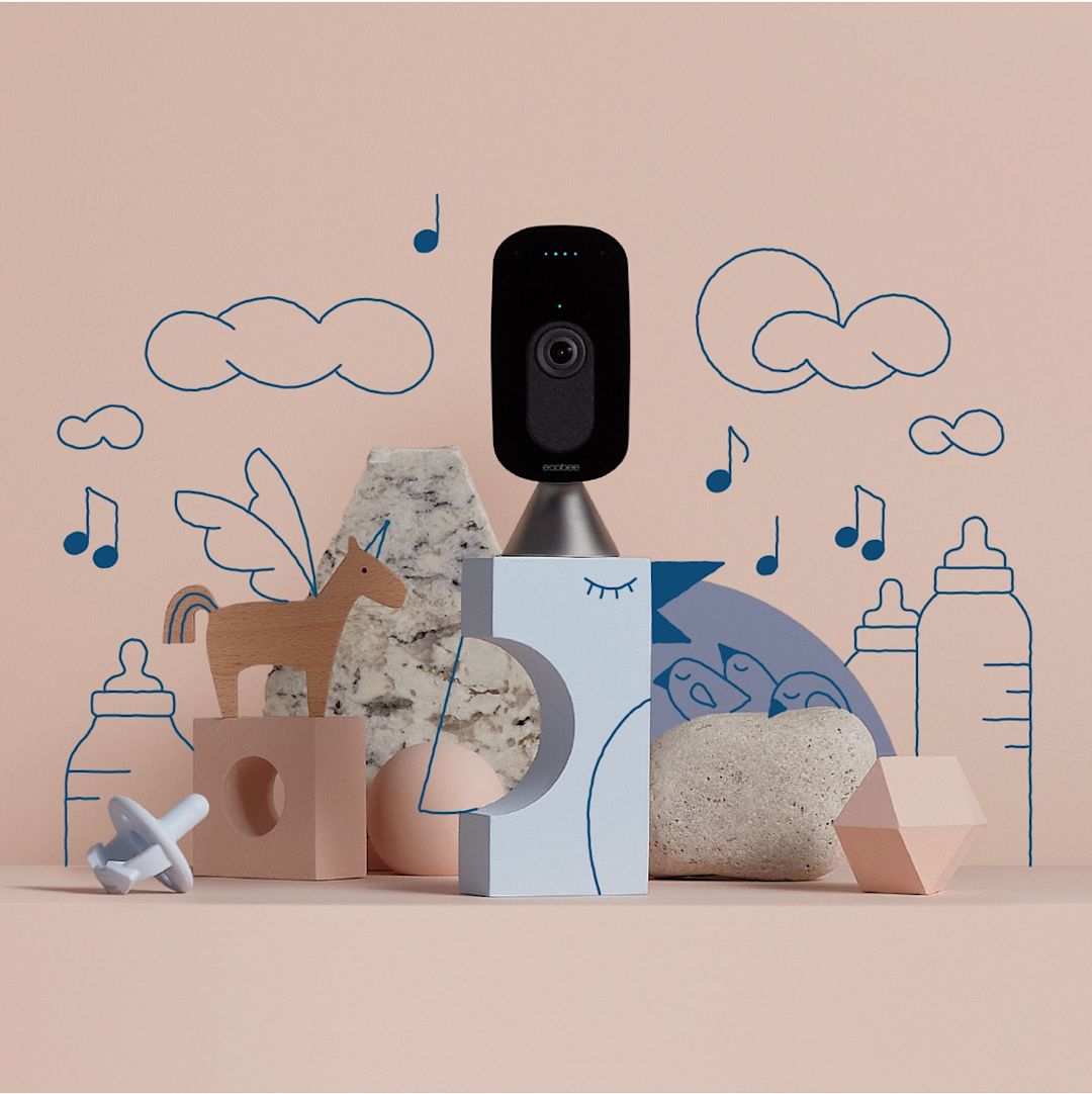 SmartCamera with voice control on a pink background