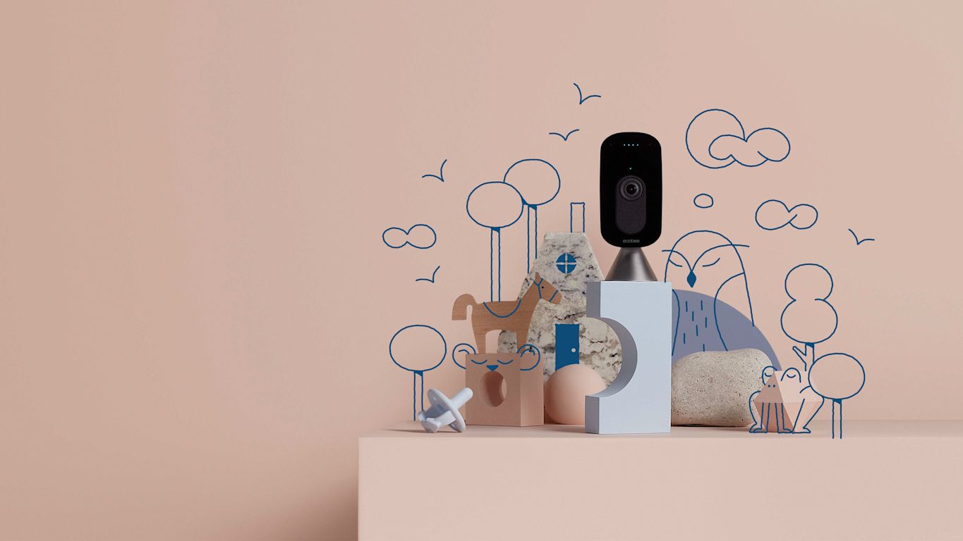 The ecobee SmartCamera sits amongst blue and pink blocks and toys.