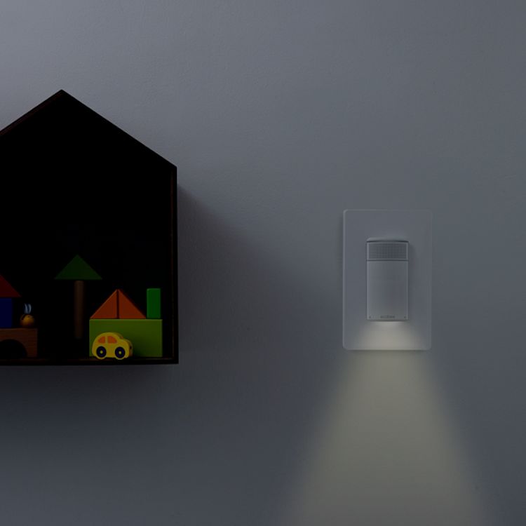 The ecobee Switch+'s nigh light shining a light in the darkness.