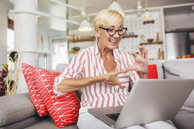 ZA - digital collabration - product1 -VF TogetherWeCan Woman Using Sign Language Laptop RGB