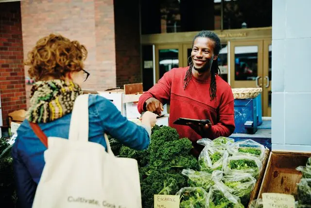 ZA - Business effiency- product1-Small-VF TogetherWeCan Woman Buying Food Tablet Device CMYK image