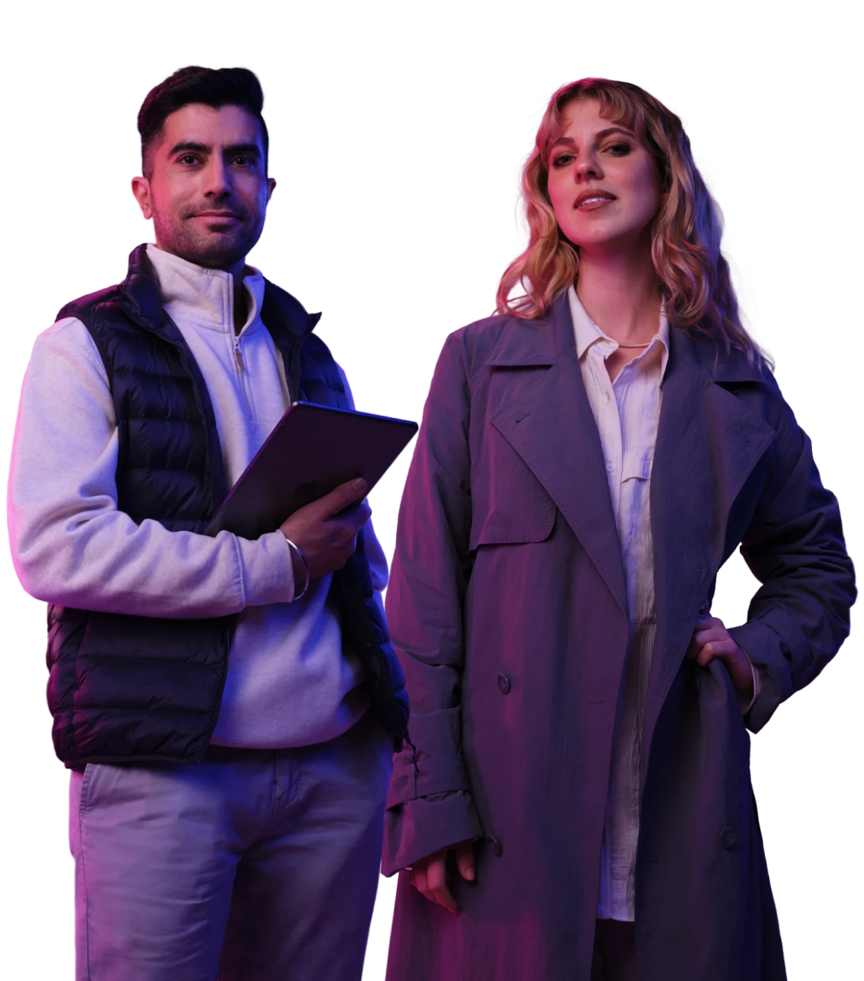 Two professionals standing side by side in stylish outfits with purple and blue lighting, one holding a tablet.