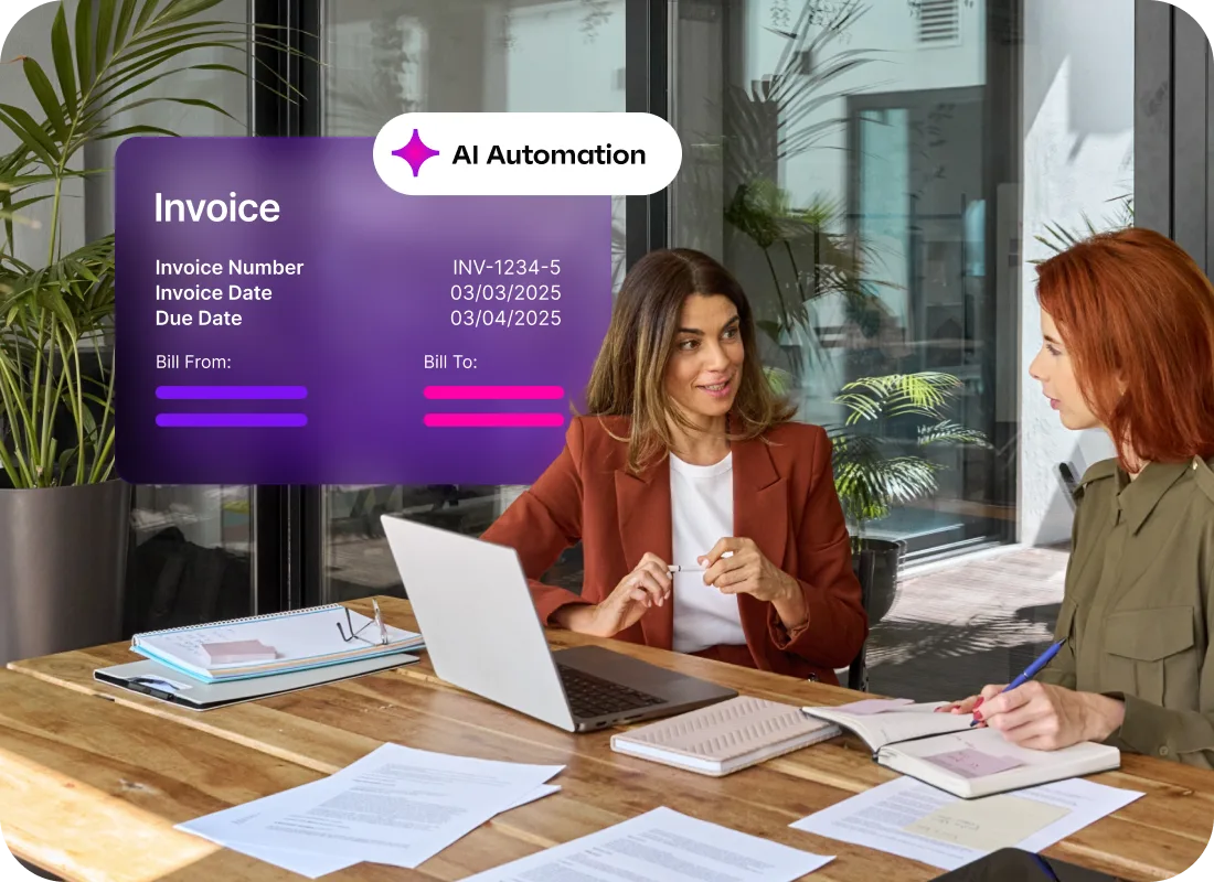 Two professionals discussing AI automation invoice system with purple digital interface showing invoice details in office setting.