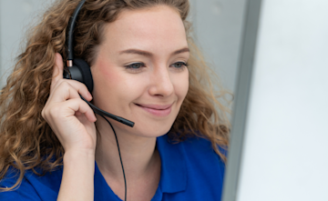 Customer support advisor on the phone with a member handling their query.