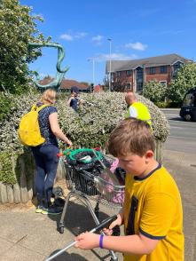 Harry and volunteers picking up rubbish from their local area. 