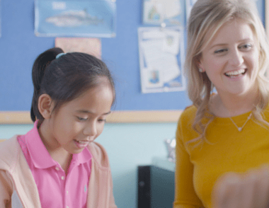 Child and tutor in Explore learning centre