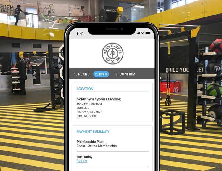 Gold's Gym website shown on mobile device with a health club interior in the background