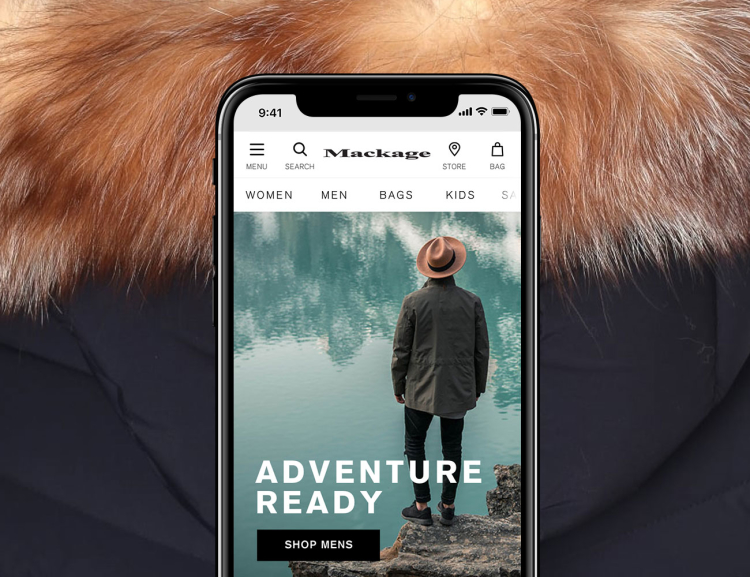 App Group Mackage website shown on mobile device with fur coat background