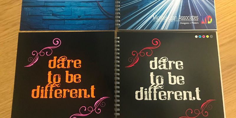 "Dare to be Different" sample showcasing beyond CMYK print including White, Clear, Gold, Silver, Mixed Metallics and Fluorescent Pink