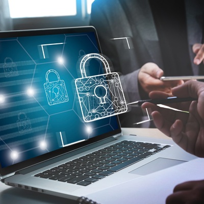 Digitized padlock overlaid over a laptop