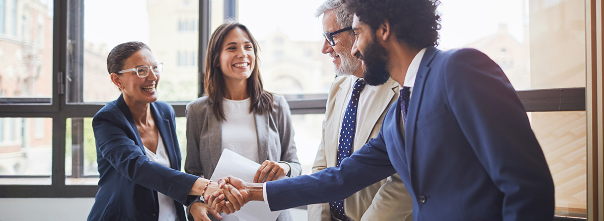 Business partners shaking hands