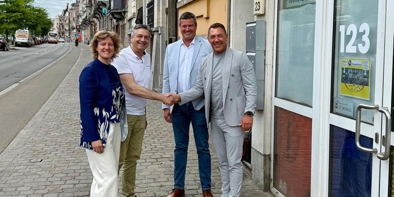 Staff of All Printing Services shaking hands