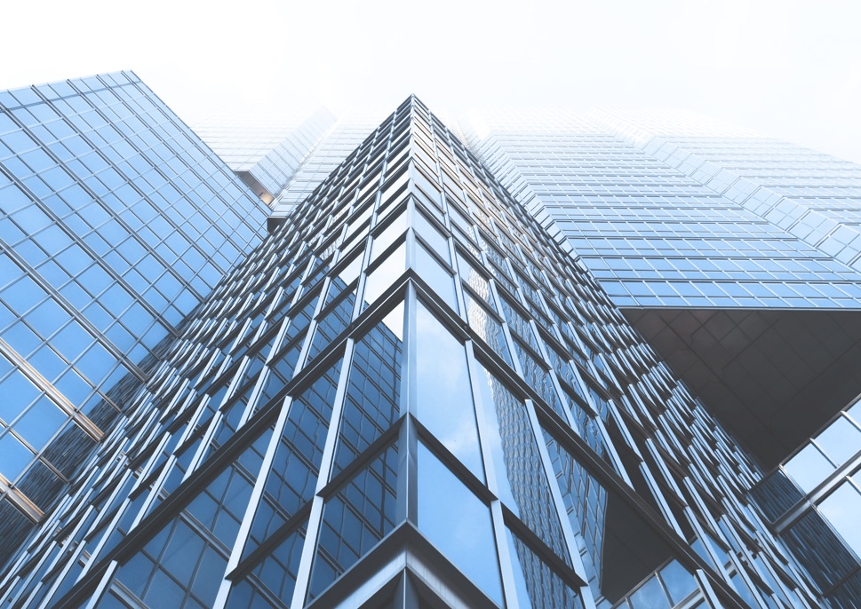 View of the side of a skyscraper from the ground up