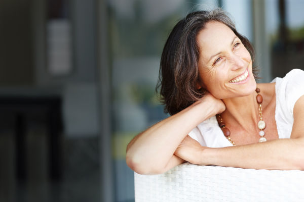 At some point in their lives, most women experience menopause. When complete, menopause can cause meaningful changes to a person’s body – including their oral health.