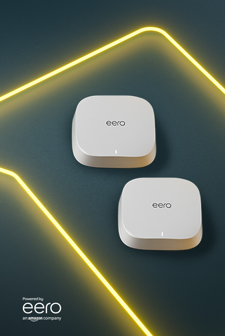 two amazon eero routers on a dark background