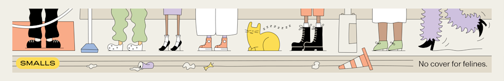 From a low viewpoint, a bunch of legs and feet in line at a bar. Trash is on the floor. A loafing cat is in the middle of the line.