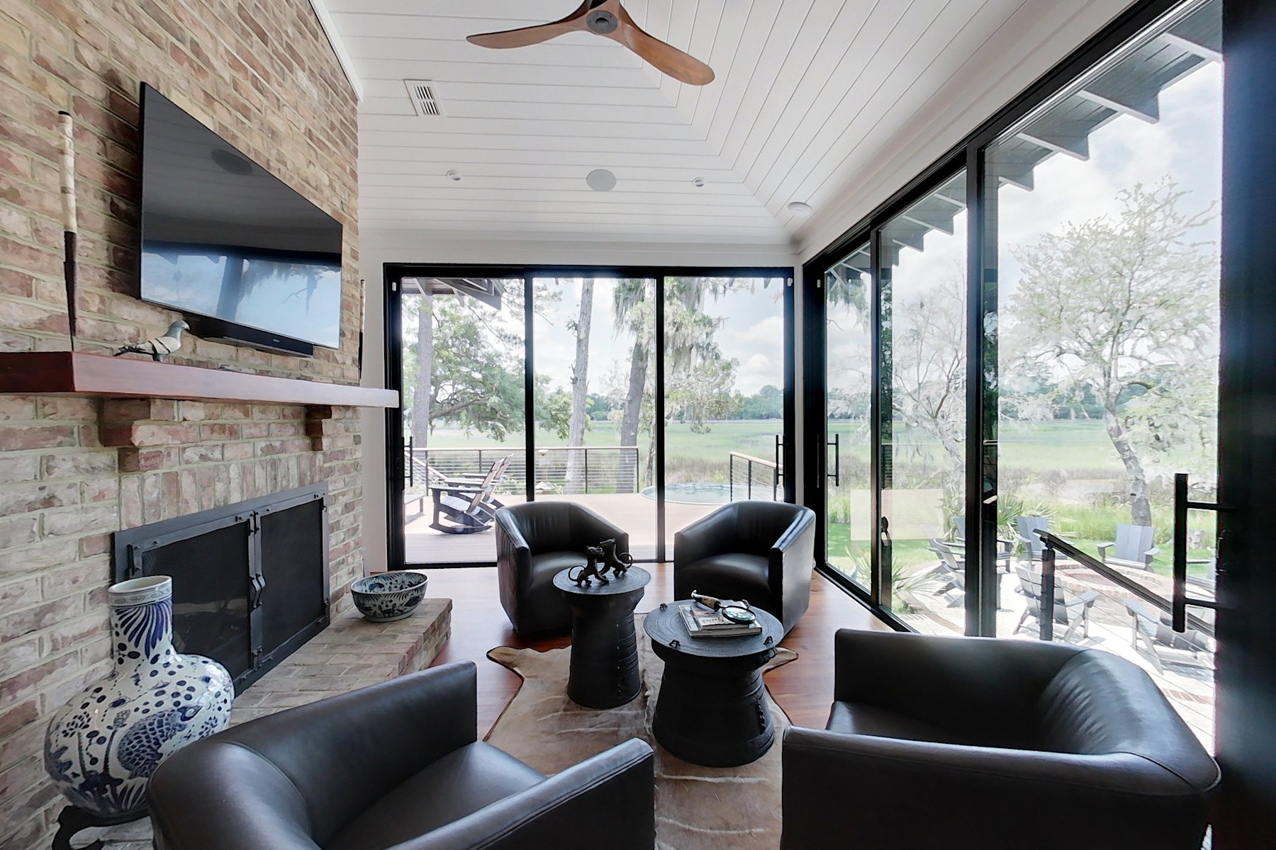 img 041 (12)enclosed porch with club chairs