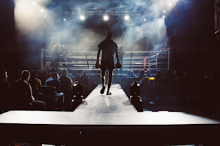 Bokser loopt naar de ring rumble foto