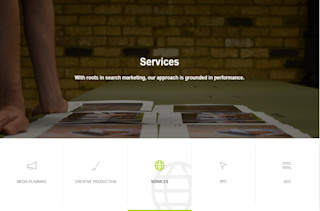 Man leading over images on a table Website