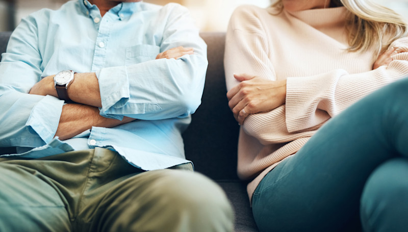couple with their arms folded