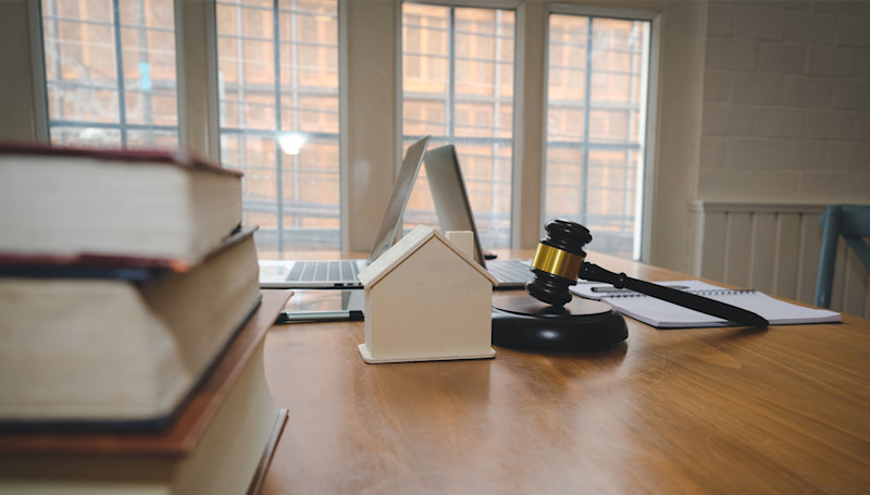 hammer and gravel on desk