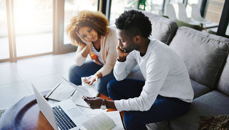 Couple looking at laptop