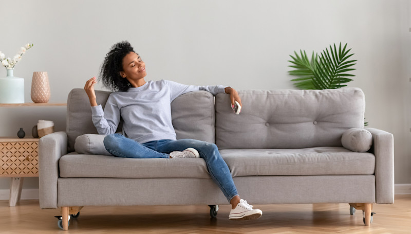 woman relaxed on sofa