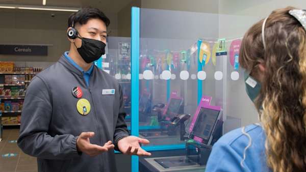 Colleagues In Store Wearing Face Coverings