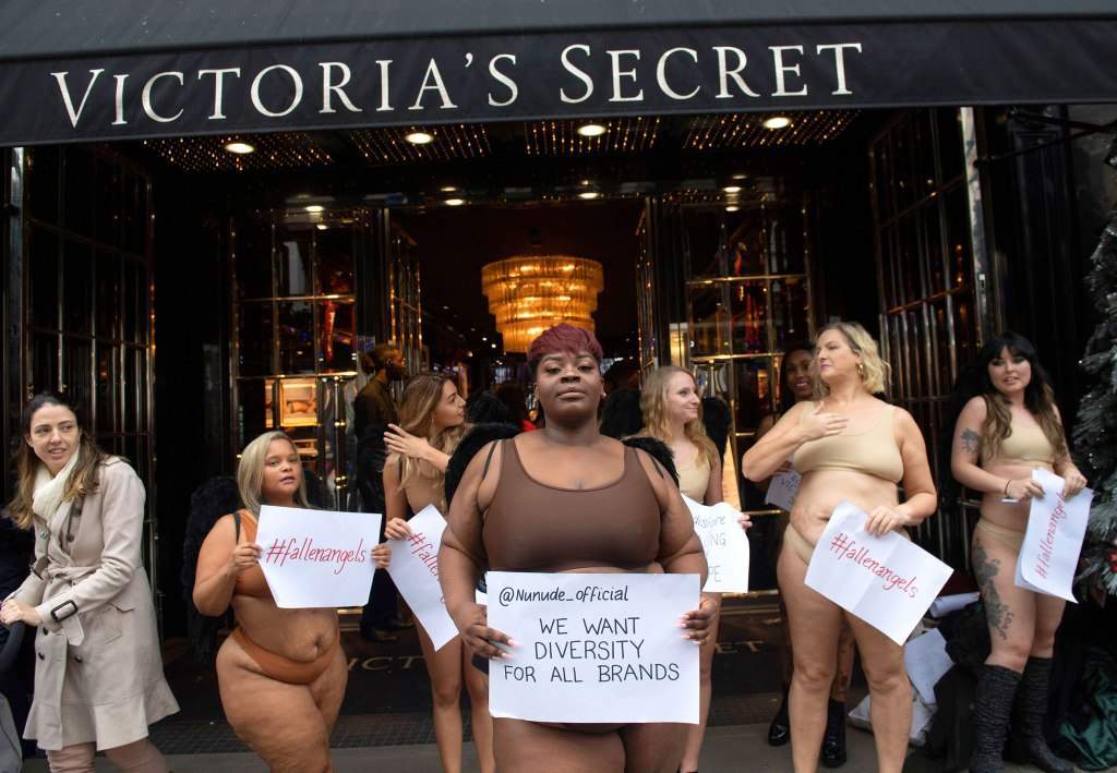 women-strip-down-to-their-underwear-to-protest-outside-victorias-secret-store-in-london