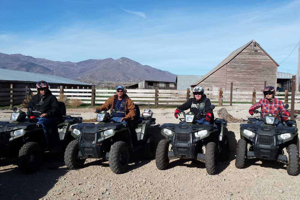The Wize leadership team rides 4 wheelers together.