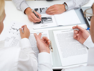 People debating investment strategies
