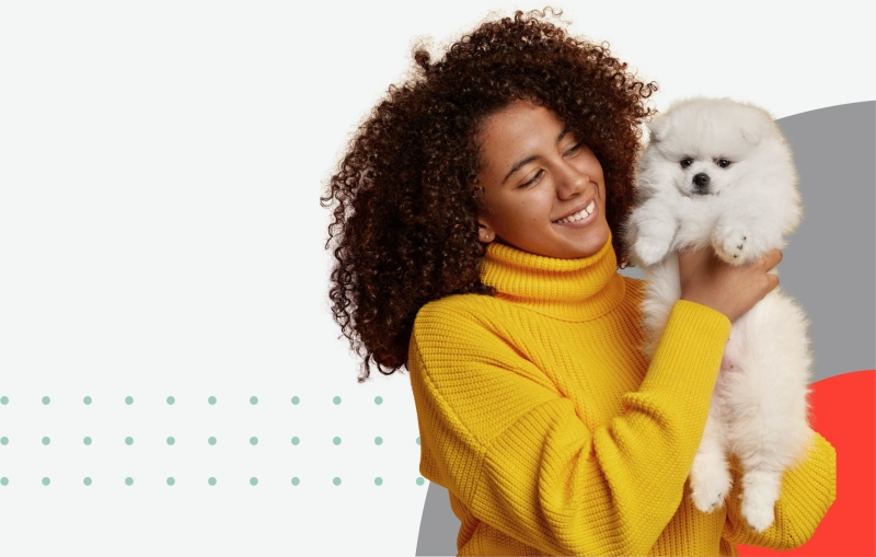 Woman holding a white poodle