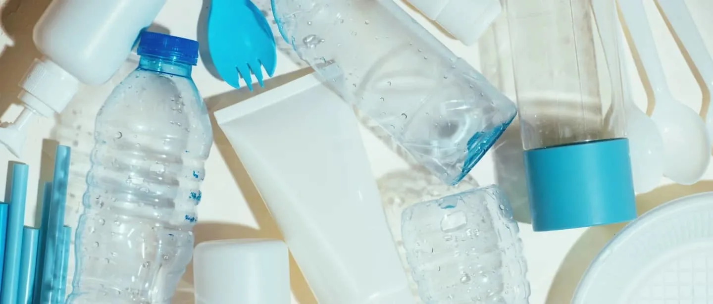 Various plastic items (bottles, utensils, straws, containers and beauty products)