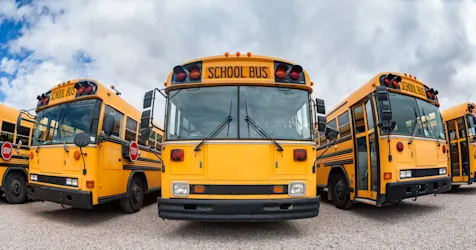 Fisheye view of parked school buses in St. George, Utah, United States.